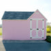Rear view of Little Cottage Company Sara's Victorian Mansion Playhouse in pink