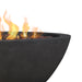 Detailed view of the edge of the Riverside Round Fire Pit C539LP-SHL with flames flickering inside