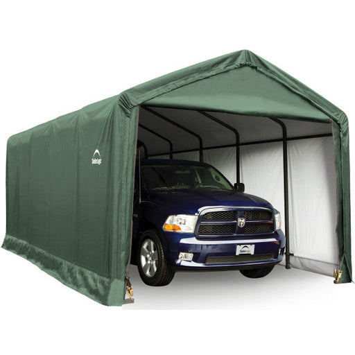 ShelterLogic ShelterTube 12 x 25 ft. Garage Green with a blue truck parked inside