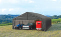 Sheltercoat 28x28 providing shade for a tractor, pick up truck, and a horse trailer