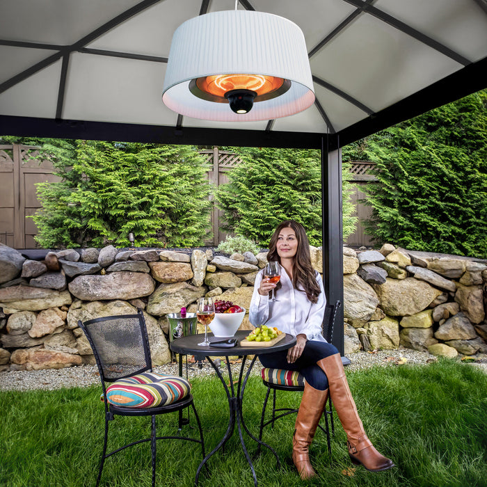 The Sol Pendant Electric Heater bathed in daylight, providing a comfortable and inviting outdoor environment for all-day enjoyment.