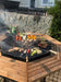 The Jag Eight Fire Pit Grill 3-in-1 BBQ Grill, Fire Pit & Table with food
