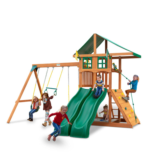 Wooden Dual Slides Swing Set Treehouse without kids in a studio