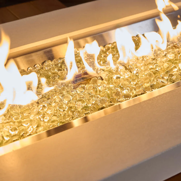 Close-up of the Fire Pit Table's flames flickering above the glass beads.