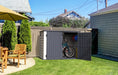 Duramax 2100L MultiStore outdoor storage shed with bike and sports equipment, ideal for backyard organization and weatherproof storage. 