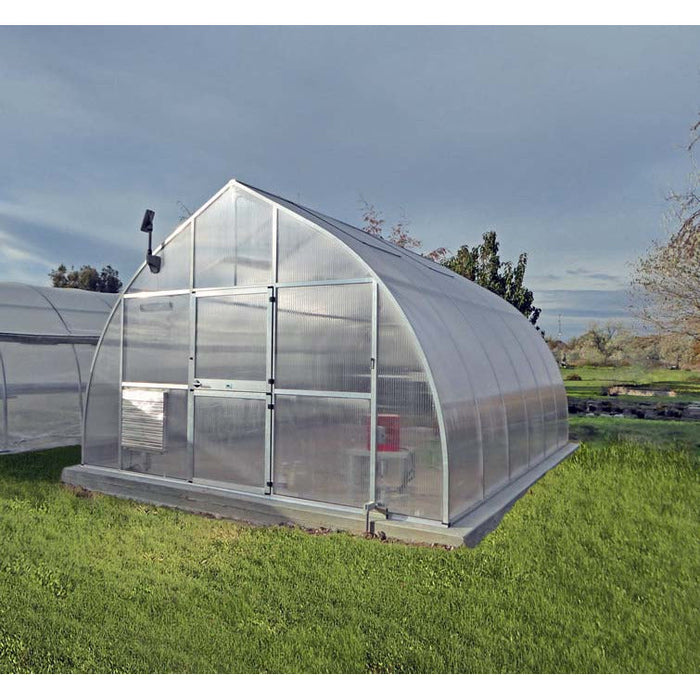 Hoklartherm Riga Greenhouse on a grassy area