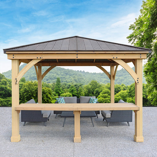 A full view of a Yardistry Meridian gazebo with a built-in bar counter, perfectly situated in an outdoor setting with picturesque hills in the background, ready for hosting and enjoying the outdoors.