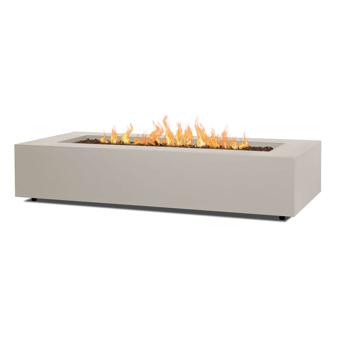 Light sand Real Flame Aegean 70" rectangle gas fire pit table with lava rock bed and dancing flames shown at angle on white background