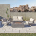 Real Flame Aegean outdoor chair lifestyle setting with fire pit table patio