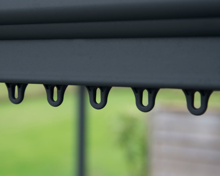 Close up detail of Palermo gazebo curtain and mosquito netting hanger hooks on grey aluminum frame rail system designed for easy attachment of gazebo accessories.