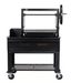 Sunterra Pro Series 48-inch Argentine brasero grill on cart, shown from the side angle showcasing its outdoor design.