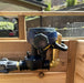 Close-up showing the valve detail of the Outdoor Living Today (OLT) Auto-Watering Kit.