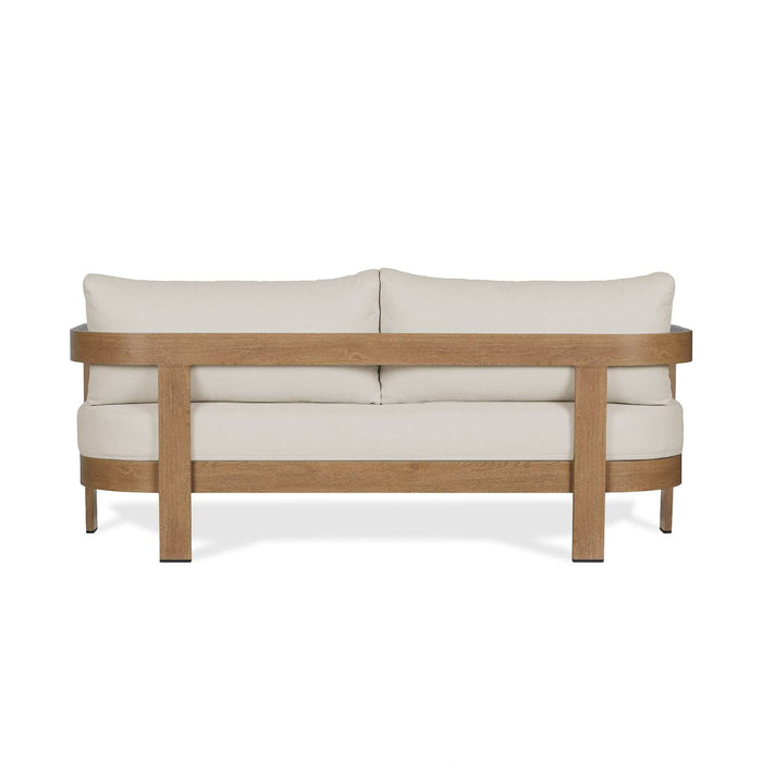 Rear view of the Real Flame Arlo Outdoor Seat Sofa with Cushions showing the smooth wooden frame and structured cushion alignment.