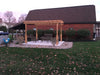 Amish Pergola-In-A-Box - 10 x 12 on a backyard with set of chairs