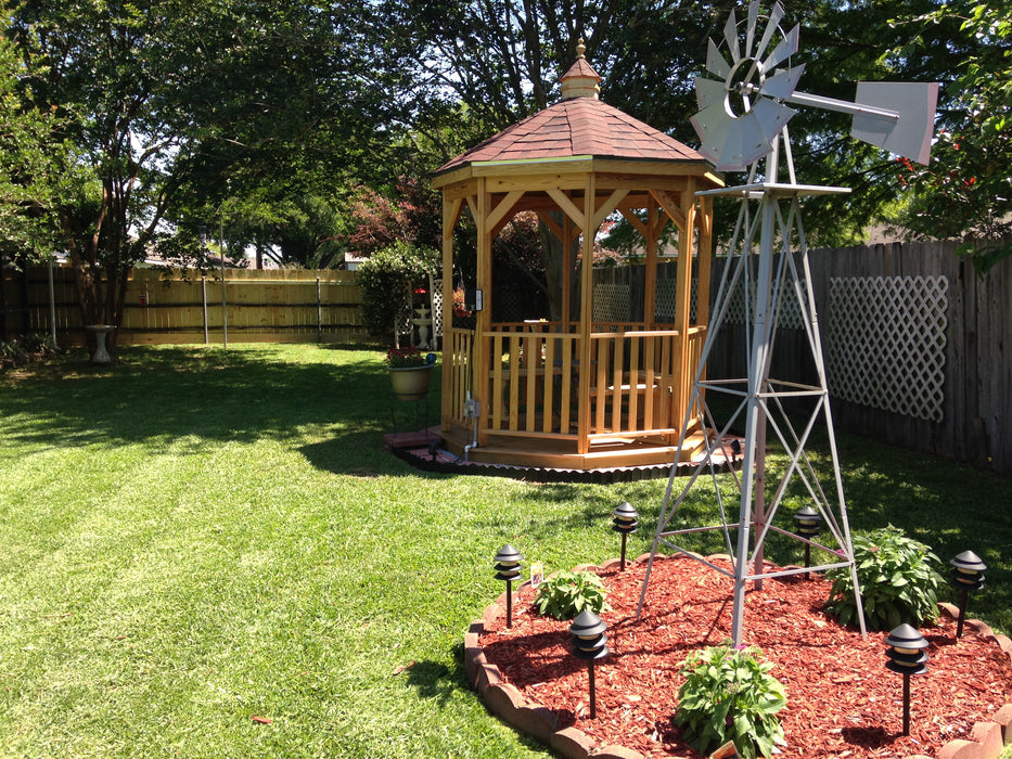 Wood Gazebo-In-A-Box with Floor on a backyard