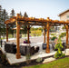 Outdoor Living Today Pergola with Retractable Canopy on a wooden deck with outdoor seating and a covered pool