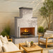 Cal Flame Escape Fireplace Tahiti model in an outdoor patio setup with burning fire and seating.
