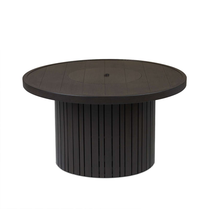 Real Flame Calvin 44" Round Fire Pit Table shown with lid closed, highlighting the black powder-coated aluminum tabletop and fluted cylindrical base on white background