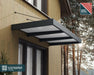 Canopia XL 3000 Awning mounted on a wall, equipped with heat block technology for improved comfort.