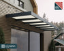 Canopia XL 6000 Awning installed on a building, featuring efficient heat block technology.