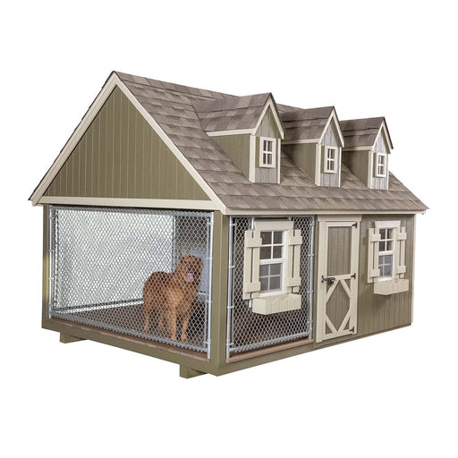 Little Cottage Co. Cape Cod Cozy Kennel isolated on white background, highlighting dormer roof, fenced run, and dog inside.