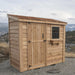 Cedar 8x4 SpaceSaver shed with a single door, shown from a side angle to highlight its compact outdoor design.