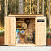 Close-up detail of the cedar siding on the Grand Garden Chalet 6x3, highlighting the wood grain and panel construction.