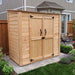 Close-up detail view of the Grand Garden Chalet 6x3 shed's cedar siding, showing wood grain and panel construction.