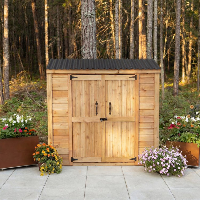 Cedar-sided 6x3 Grand Garden Chalet shed with double doors and a peaked roof, shown from the front exterior.