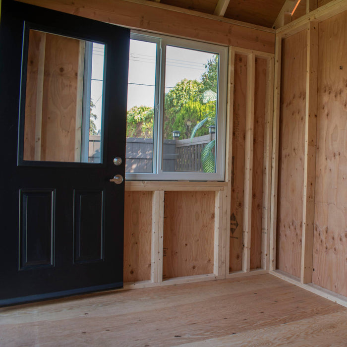 Cedar Saltbox Studio Shed 12x8 with sloped roof and double doors, shown in main exterior view.