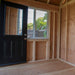 Cedar Saltbox Studio Shed 12x8 with sloped roof and double doors, shown in main exterior view.