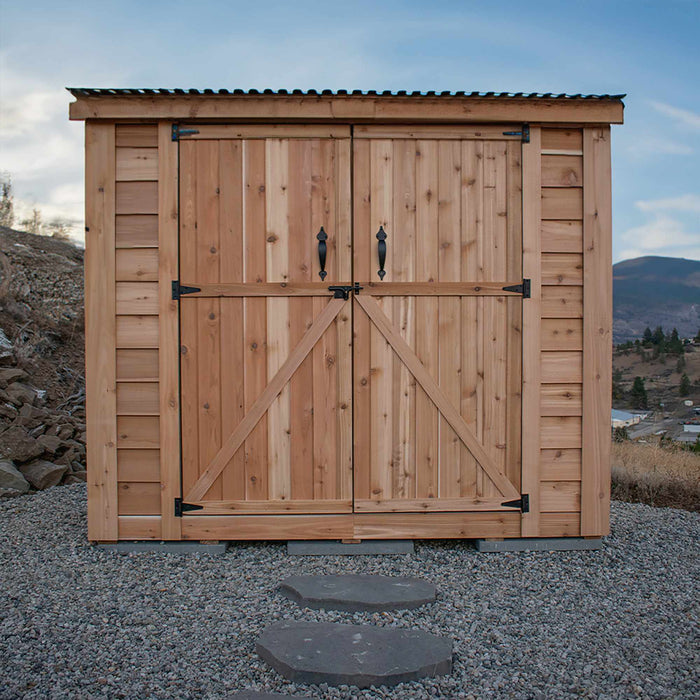 Close-up of the cedar SpaceSaver 8x4 shed's double door detail, showing natural wood grain and sturdy hardware.