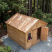 Side angle view of the 12x12 cedar Space Master storage shed with its double doors closed.