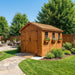 Close-up detail of the 8x12 Space Master cedar storage shed, showing wood grain and panel construction.