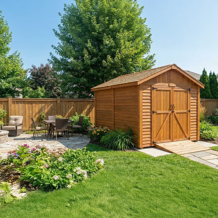 8x12 cedar storage shed with double doors and peaked roof, shown in a grassy backyard setting.