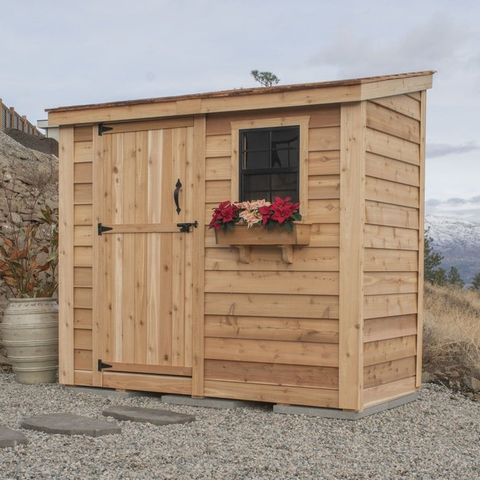 Cedar storage shed with a single door, shown from a side angle to highlight its SpaceSaver 8x4 design.