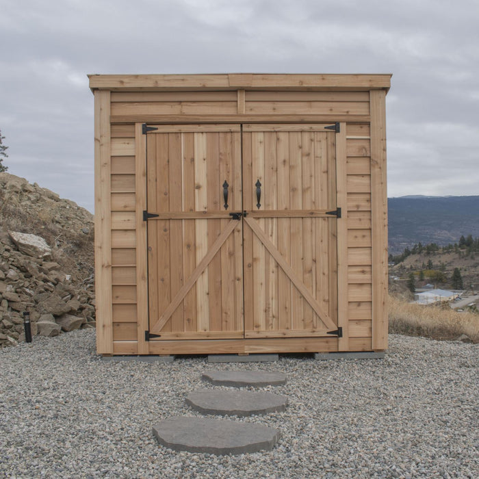 Cedar SpaceSaver 8x4 storage shed with double doors closed, shown from the front on a paved surface.