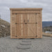 Cedar SpaceSaver 8x4 storage shed with double doors closed, shown from the front on a paved surface.