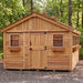 Detail view of the cedar Sunshed garden shed 12x16, highlighting its wood grain and door hardware.
