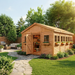 Cedar Sunshed garden shed 12x16 shown from a side angle, highlighting its paneled doors and peaked roof design.
