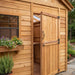 Close-up detail of the cedar Sunshed 8x8 garden shed, showcasing its natural wood grain and sturdy construction.