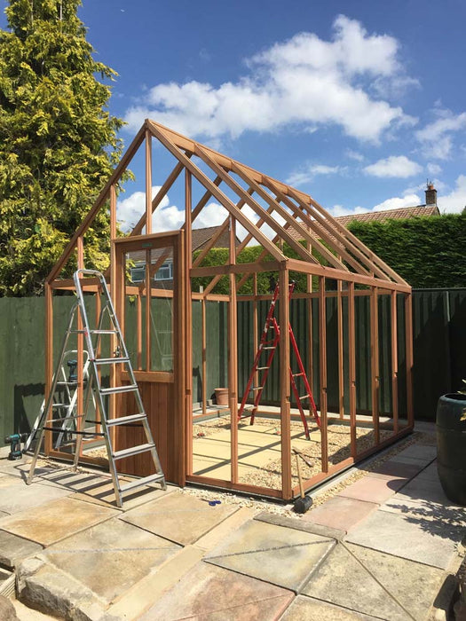 Partial frame construction of the Alton Cedar Structure Cheltenham Victorian Greenhouse.