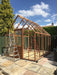 Partial frame construction of the Alton Cedar Structure Cheltenham Victorian Greenhouse.