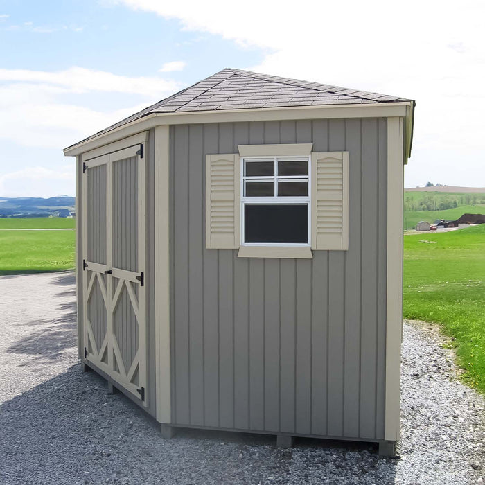 Exterior view of Classic Five Corner Shed by Little Cottage Co. featuring barn-style double doors, shuttered side window, and wood siding panels
