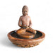 Rust colored Exaco Buddha Fountain ideal for patios or zen gardens, featuring water gently flowing from a Buddha figure into a round base.