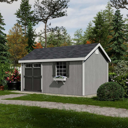 Gray Little Cottage Co. Colonial Pinehurst Shed featuring black double doors, white trim, and a window with a flower box in a garden setting.