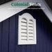 Close-up of Colonial-style white louvered vent on a navy blue shed wall from the Little Cottage Kits Colonial Series, designed to enhance airflow and reduce moisture buildup.