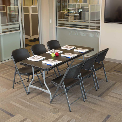Office conference setup using Lifetime 4 Pack 6-Foot Rectangle Nesting Table 480350 with six folding chairs