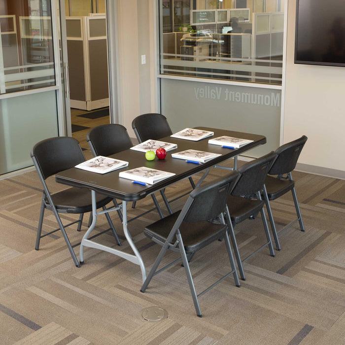Office conference setup using Lifetime 4 Pack 6-Foot Rectangle Nesting Table 480350 with six folding chairs