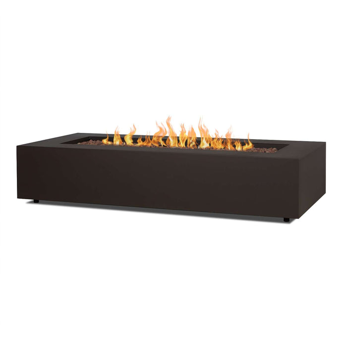 Real Flame Aegean 70" rectangular propane fire pit table in dark bronze finish with lava rocks and tall flames, angled product view on white